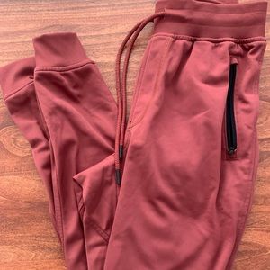 Size small UA burnt orange joggers like new